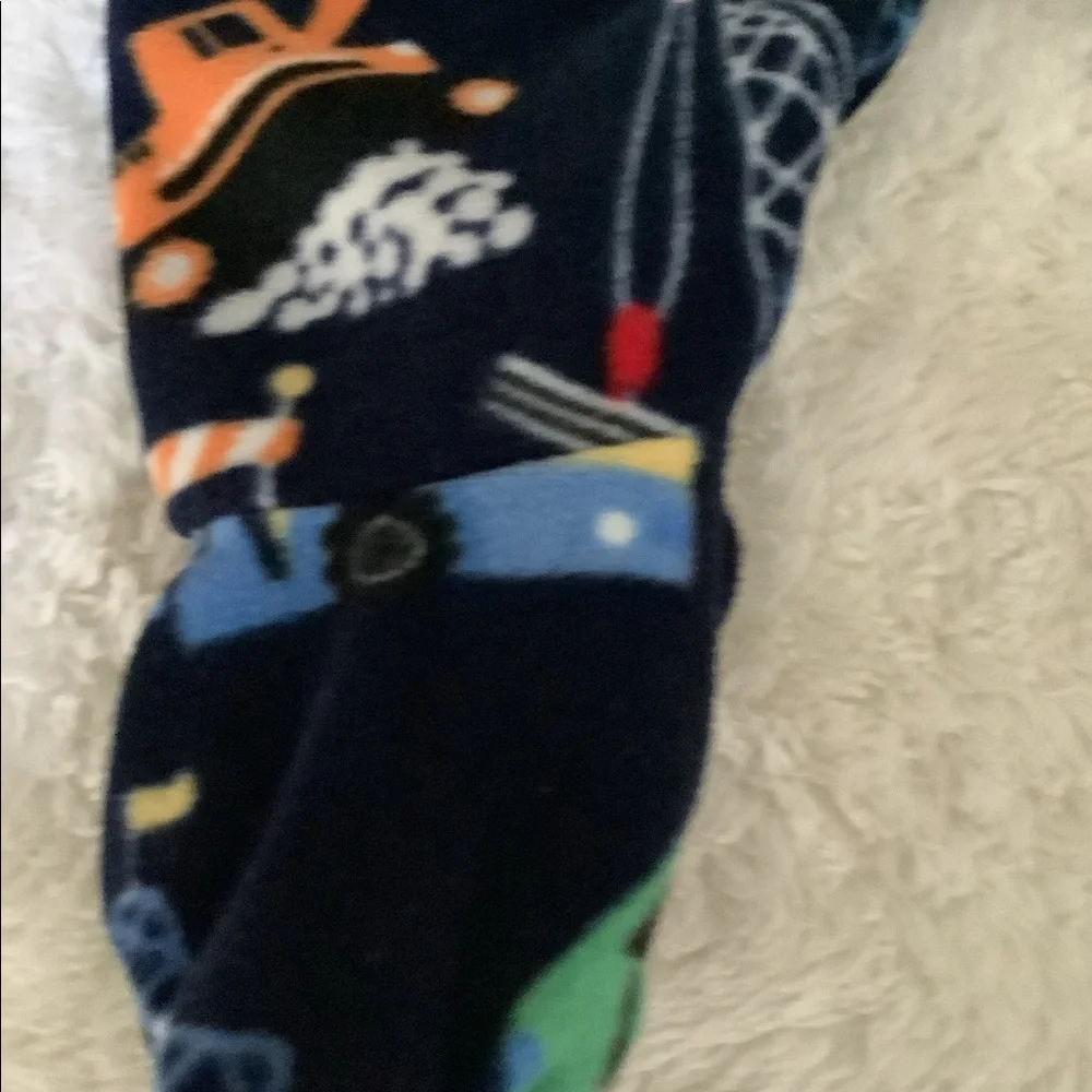 Place one-size zipper outfit with big machines 0-3mo